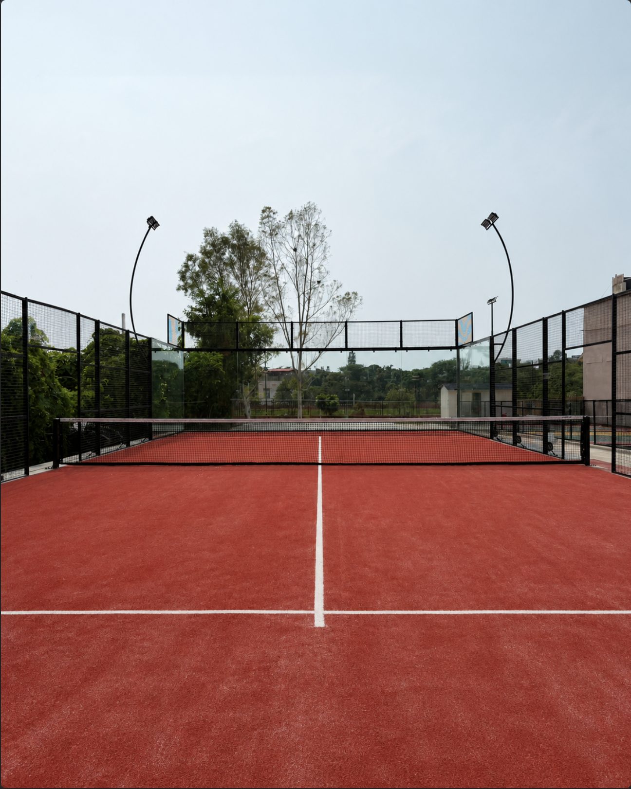Panoramic padel court with glass walls at Padel Fort